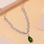 chrome diopside and white topaz necklace in rhodium over sterling silver shown in a lifestyle photo