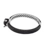side view of black spinel and chrome diopside panther cuff bracelet in black and white rhodium over sterling silver