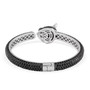 back view of black spinel and chrome diopside panther cuff bracelet in black and white rhodium over sterling silver
