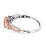 side view of peach quartz triplet bangle bracelet in 18k rose gold and rhodium over sterling silver