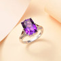 amethyst brown and white zircon ring in rhodium over sterling silver shown in a lifestyle photo