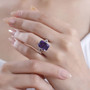 amethyst brown and white zircon ring in rhodium over sterling silver worn on a hand