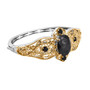 side view of black spinel bangle bracelet in 18k yellow gold and rhodium over sterling silver