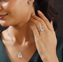 prasiolite and peridot jewelry set in rhodium over sterling silver shown being worn
