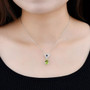 peridot garnet and white zircon lotus necklace in rhodium over sterling silver worn around the neck