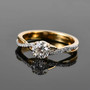 close up of diamond engagement ring in 18k yellow gold