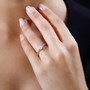 diamond engagement ring in 18k yellow gold worn on a hand