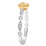side view of heart yellow and white diamond ring in 18k two-tone gold