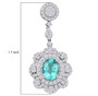paraiba tourmaline and diamond earrings in 950 platinum shown for size comparison