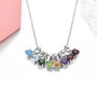 full view of rhodolite garnet 5mm round solitaire necklace in rhodium over sterling silver