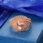 morganite and white zircon ring in 18k rose gold over sterling silver shown in a lifestyle photo