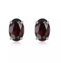 swiss blue topaz 6x4mm oval studs in rhodium over 925 sterling silver