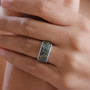 green and white diamond cluster band ring in 10k white gold on hand model