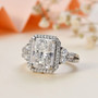 rhodium over sterling silver moissanite halo ring shown in a lifestyle photo