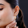 white jade pear drop earrings in 18k yellow gold over sterling silver worn on the ear