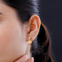 golden south sea pearl citrine and zircon 18k yellow gold over sterling silver earrings worn on the ear