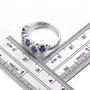 full view of blue sapphire and white zircon rhodium over sterling silver band ring