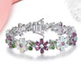 rhodolite garnet ethiopian opal and chrome diopside rhodium over sterling silver tennis bracelet shown in a lifestyle photo