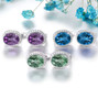 close up of green fluorite and white zircon halo earrings in rhodium over sterling silver
