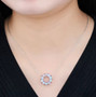ethiopian opal and pink tourmaline rhodium over sterling silver circle necklace worn around the neck