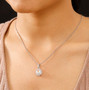 mercury mist topaz and white zircon halo pendant necklace in rhodium over sterling silver worn around the neck