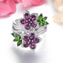 front view of rhodolite garnet chrome diopside and white zircon rhodium over sterling silver flower cluster bypass ring