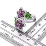 rhodolite garnet chrome diopside and white zircon rhodium over sterling silver flower cluster bypass ring shown for size comparison