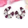 rhodolite garnet and opal multi gemstone rhodium over sterling silver earrings shown in a lifestyle photo