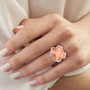 morganite and diamond 14k rose gold ring worn on a hand