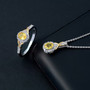 yellow sapphire and white zircon two-tone jewelry set in 18k yellow gold and rhodium over sterling silver shown in a lifestyle photo
