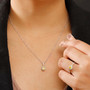 yellow sapphire and white zircon two-tone jewelry set in 18k yellow gold and rhodium over sterling silver shown being worn