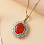 fire opal yellow and white diamond halo pendant necklace in 14k yellow gold shown in a lifestyle photo