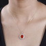 fire opal yellow and white diamond halo pendant necklace in 14k yellow gold worn around the neck