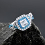 diamond and blue apatite double halo 950 platinum ring shown in a lifestyle photo