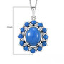 ceruleite and moissanite oval halo pendant necklace in rhodium over sterling silver shown for size comparison