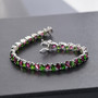 rhodolite garnet and chrome diopside rhodium over sterling silver tennis bracelet shown in a lifestyle photo