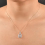morganite paraiba tourmaline and diamond emerald cut halo pendant necklace in 14k rose gold worn around the neck