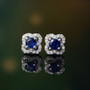 blue kyanite and white zircon rhodium over sterling silver halo stud earrings shown in a lifestyle photo