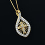 moissanite cross 18k yellow gold over sterling silver pendant necklace shown in a lifestyle photo