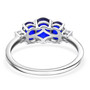 back view of blue spinel trilogy ring and moissanite accents in rhodium over sterling silver