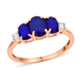 oval blue spinel trilogy ring with moissanite accents in 18k rose gold over sterling silver deep navy blue gemstone ring elegant three stone style