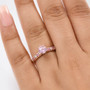 kunzite pink sapphire and moissanite 18k rose gold over sterling silver ring worn on a hand