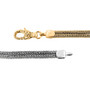 clasp detail of love knot bracelet in 18k yellow gold and rhodium over sterling silver