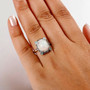 ethiopian opal paraiba tourmaline champagne and white diamond ring in rhodium over sterling silver worn on a hand