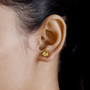 heliodor trillion stud earrings in 18k yellow gold over sterling silver worn on the ear