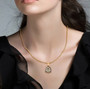 turkizite champagne and white diamond halo necklace in 18k yellow gold over sterling silver worn around the neck