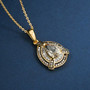 turkizite champagne and white diamond halo necklace in 18k yellow gold over sterling silver shown in a lifestyle photo