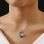 opal and chrome diopside grandidierite and zircon flower cluster necklace in rhodium over sterling silver worn around the neck