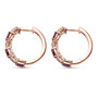 side view of rhodolite garnet tsavorite garnet and moissanite hoop earrings in 18k rose gold over sterling silver
