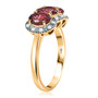 side view of rubellite tourmaline paraiba tourmaline and diamond trilogy ring in 10k yellow gold